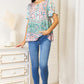 Double Take Floral Tie Neck Short Sleeve Blouse
